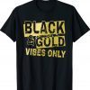 Black and golds cool vintage tshirt